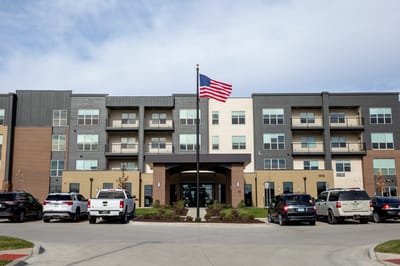 Exterior view of Attivo Trail facility with American flag