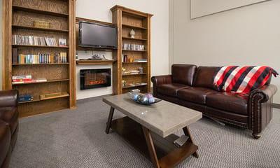 Cozy common area with comfortable seating and entertainment