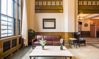 Interior lounge area with seating and plants