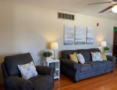 Comfortable living room with seating and decor
