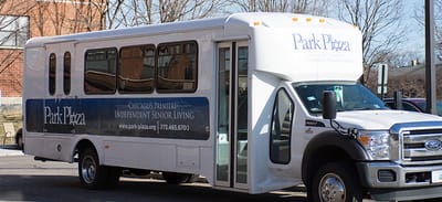 Facility transport vehicle with branding