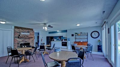 Bright common area with tables and chairs