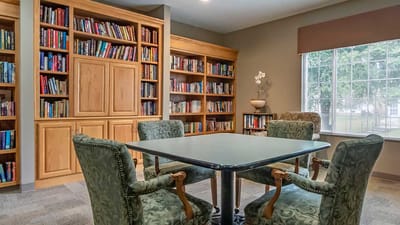 Interior view of a library with bookshelves and seating