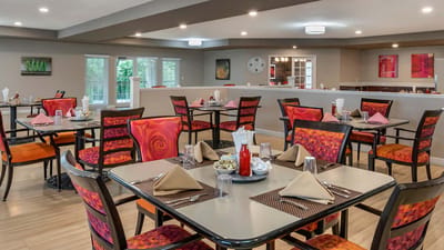 Bright dining area with colorful decor and tables