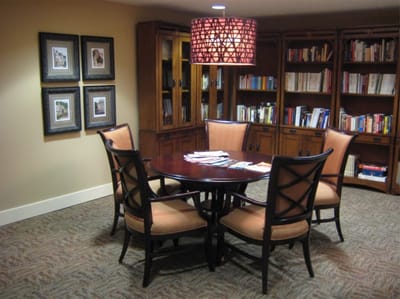 Cozy reading area with a table and chairs
