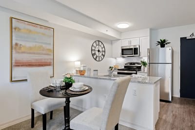 Bright and modern kitchenette area with dining table