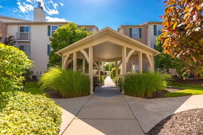 Outdoor walkway leading to the facility entrance