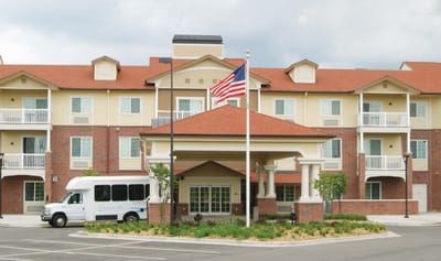 Exterior view of Shawnee Hills facility with transport van
