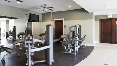Interior view of a fitness room with exercise equipment