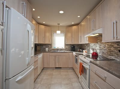 Modern kitchen interior with cabinets and appliances
