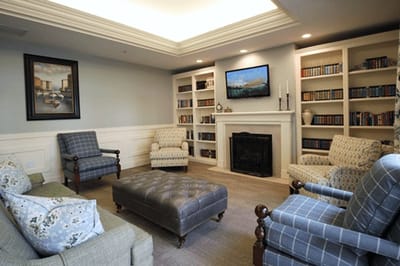 Cozy common area with seating and a fireplace
