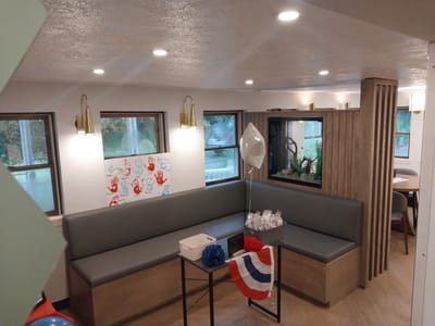 Bright interior common area with seating and decor