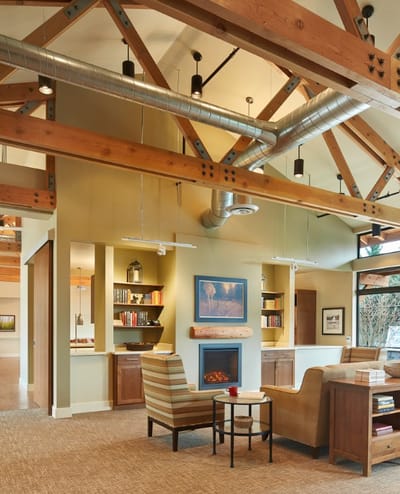 Cozy common area with seating and a fireplace