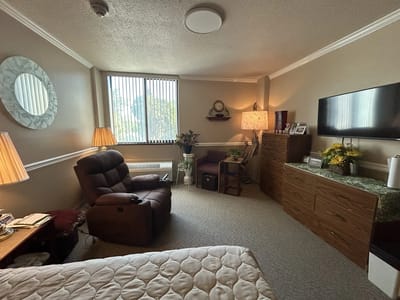 Cozy private room with comfortable furniture and decor