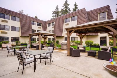 Outdoor seating area with shaded gazebos