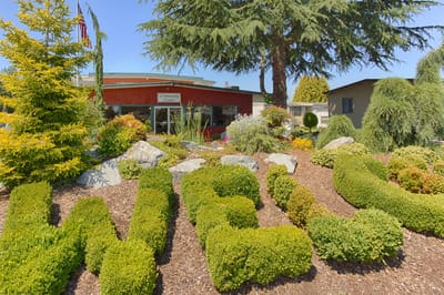 Welcoming garden entrance to the senior living facility