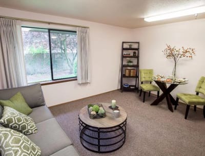 Bright common area with seating and decor
