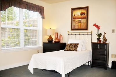 Bright interior view of a resident room with decor