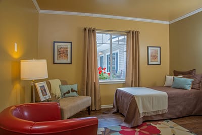 Cozy resident room with a view of flowers