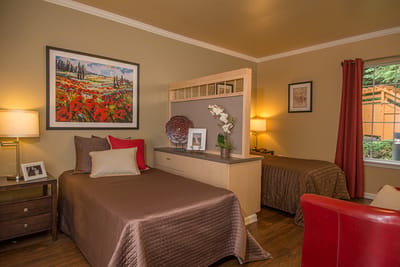 Cozy interior of a resident room with twin beds