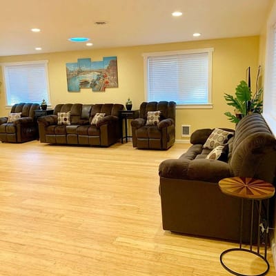 Brightly lit interior common area with seating