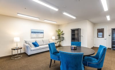 Bright common area with seating and decor