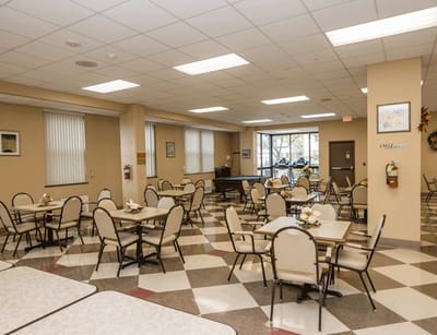 Bright dining area with tables and chairs