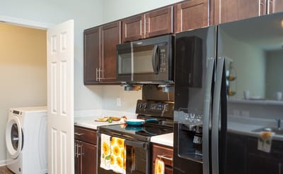 Bright kitchen area with modern appliances