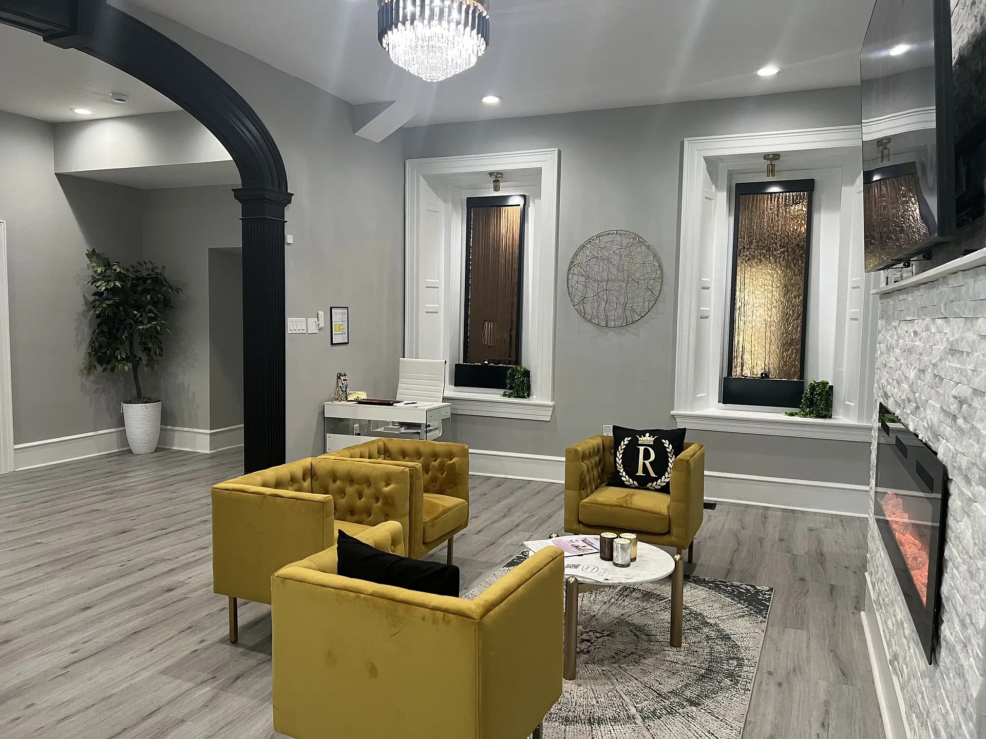 Bright common area with stylish furniture and decor