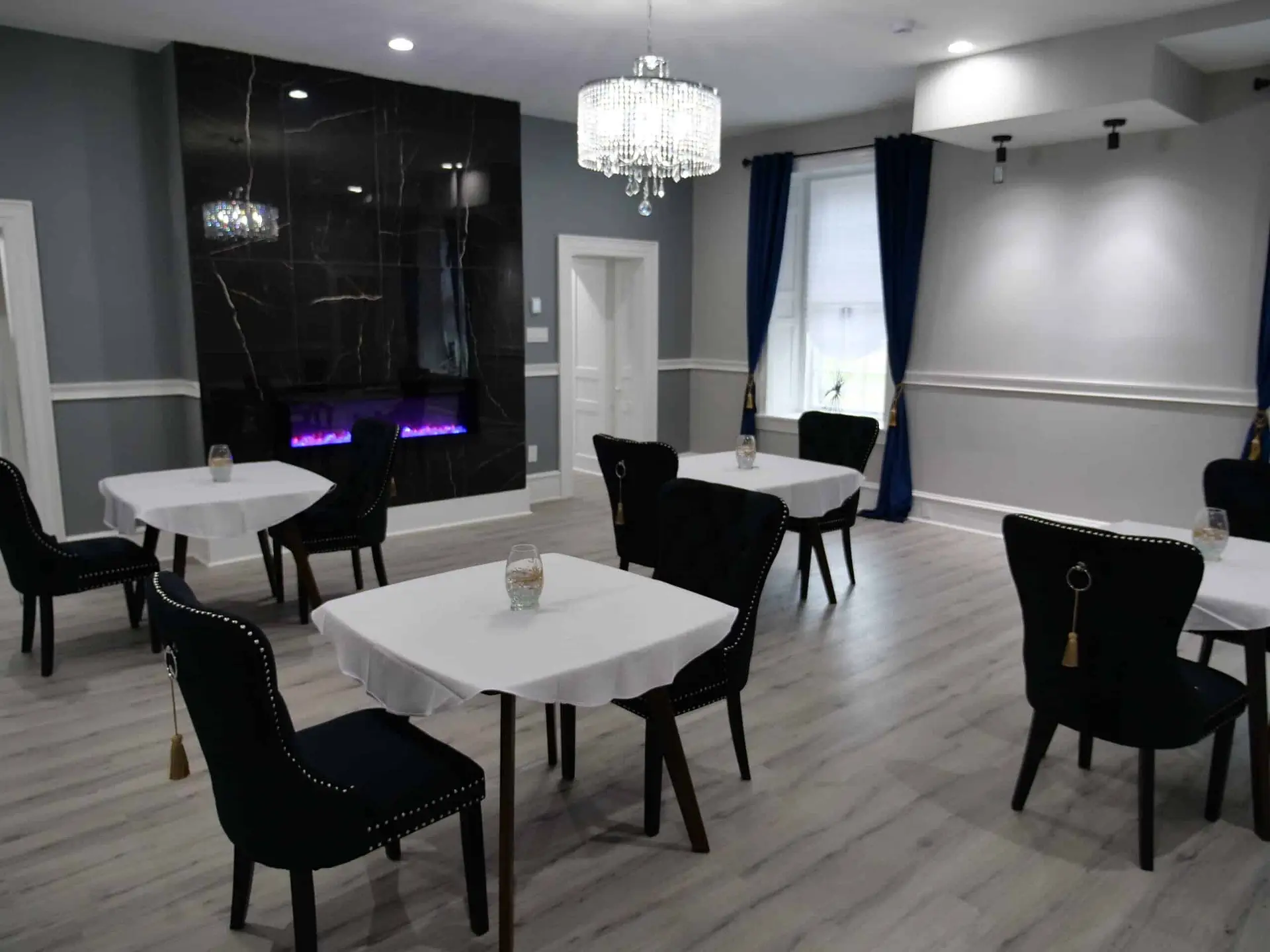 Interior dining room with tables and chandelier