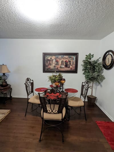 Dining area with a table and decorative elements
