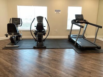Fitness equipment in a bright exercise room