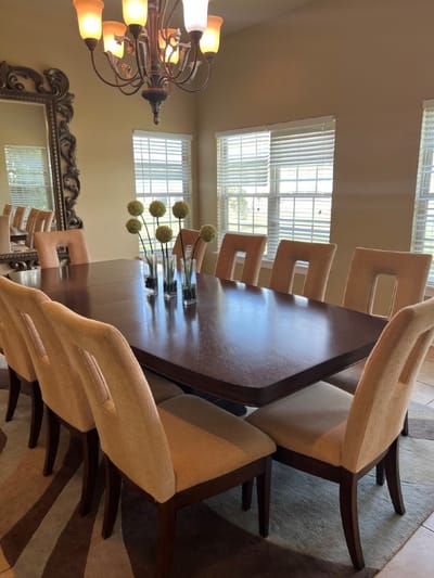 Dining room with a large table and chairs