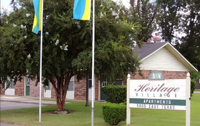 Exterior view of Heritage Village building and sign
