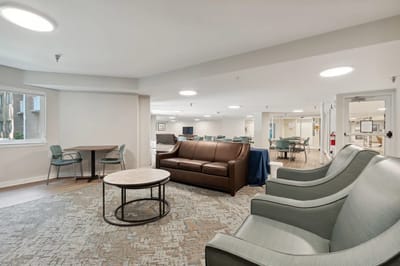 Common area with seating and tables in the facility