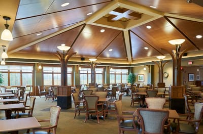 Interior view of a spacious dining area with wooden accents