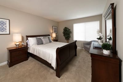 Stylish private resident room with a queen bed and decor
