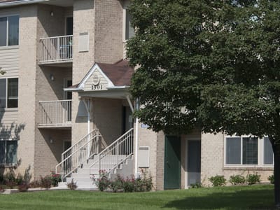 Exterior view of a senior living building entrance