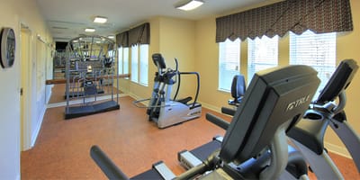 Interior view of a fitness room with exercise equipment