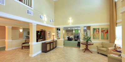 Bright interior common area with seating and decor