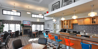 Common area with dining tables and seating