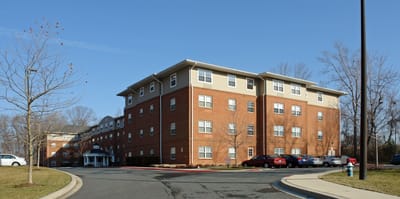 Exterior view of a brick nursing home building