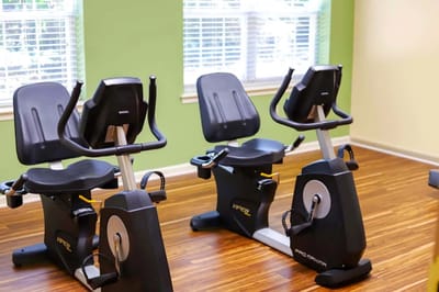 Exercise equipment set up in a facility gym area