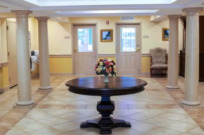 Interior view of a common area with a flower arrangement