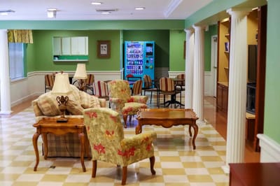 Comfortable lounge area with furniture and a vending machine