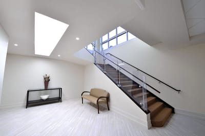 Bright interior lobby with seating and stairs