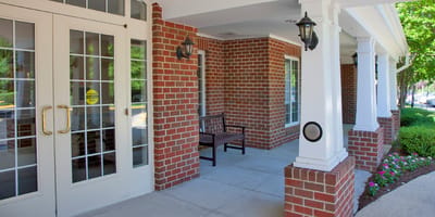 Entrance of the Willows Senior Community with seating area
