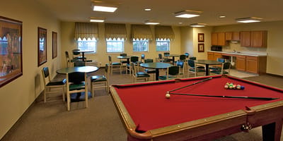 Common area with billiard table and seating