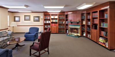 Cozy interior of a common area with bookshelves