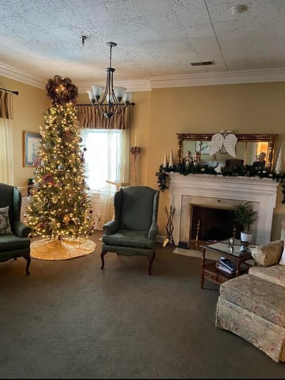 Decorated interior common area with a Christmas tree